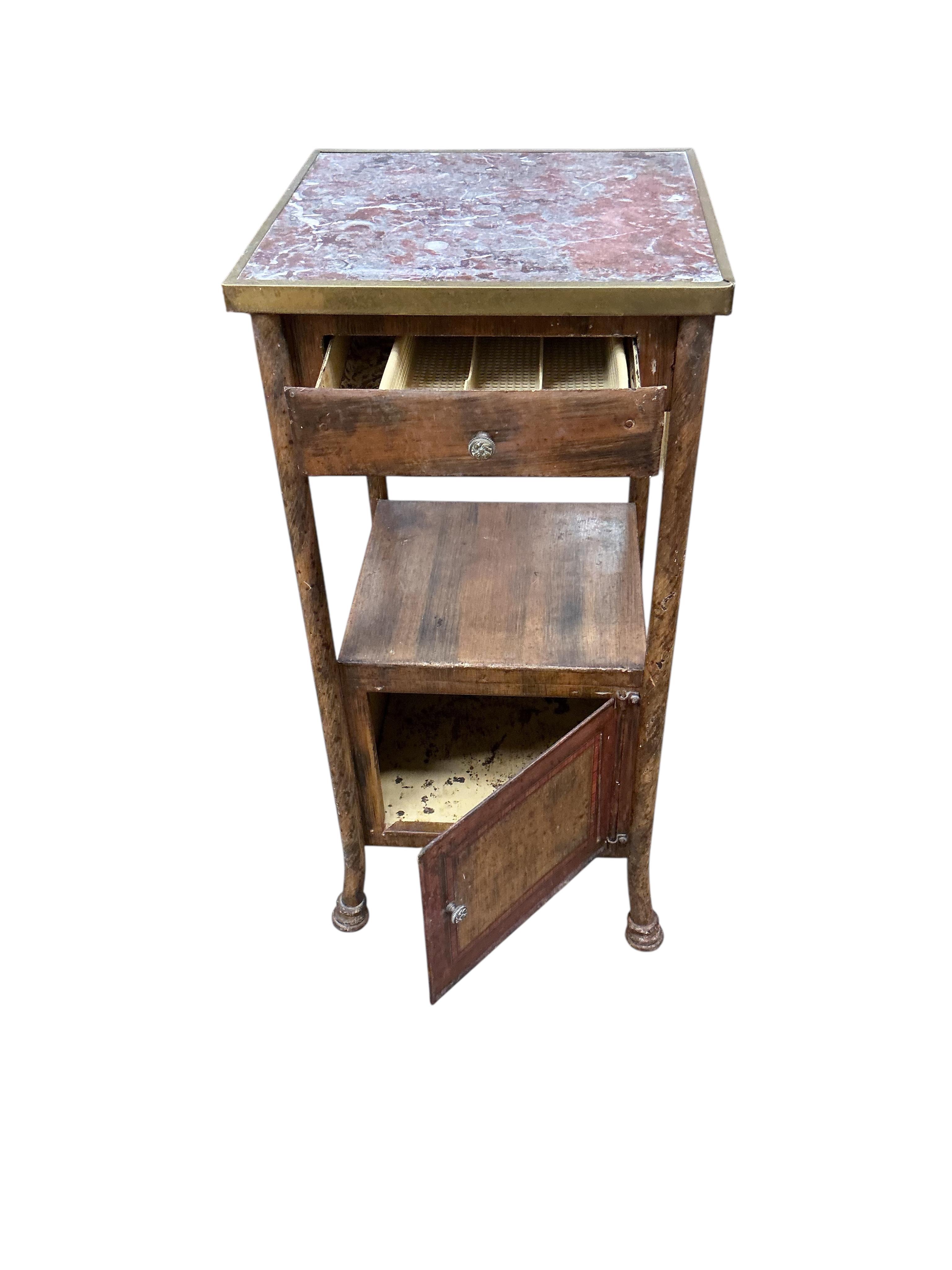 A late 19th / early 20th century French toleware marble topped washstand, with simulated painted grain, width 37cm, depth 35cm, height 77cm